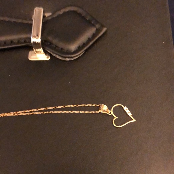 Dainty necklace. 14k gold chain with dainty 10k heart charm. 3 tiny diamonds. - Picture 2 of 5